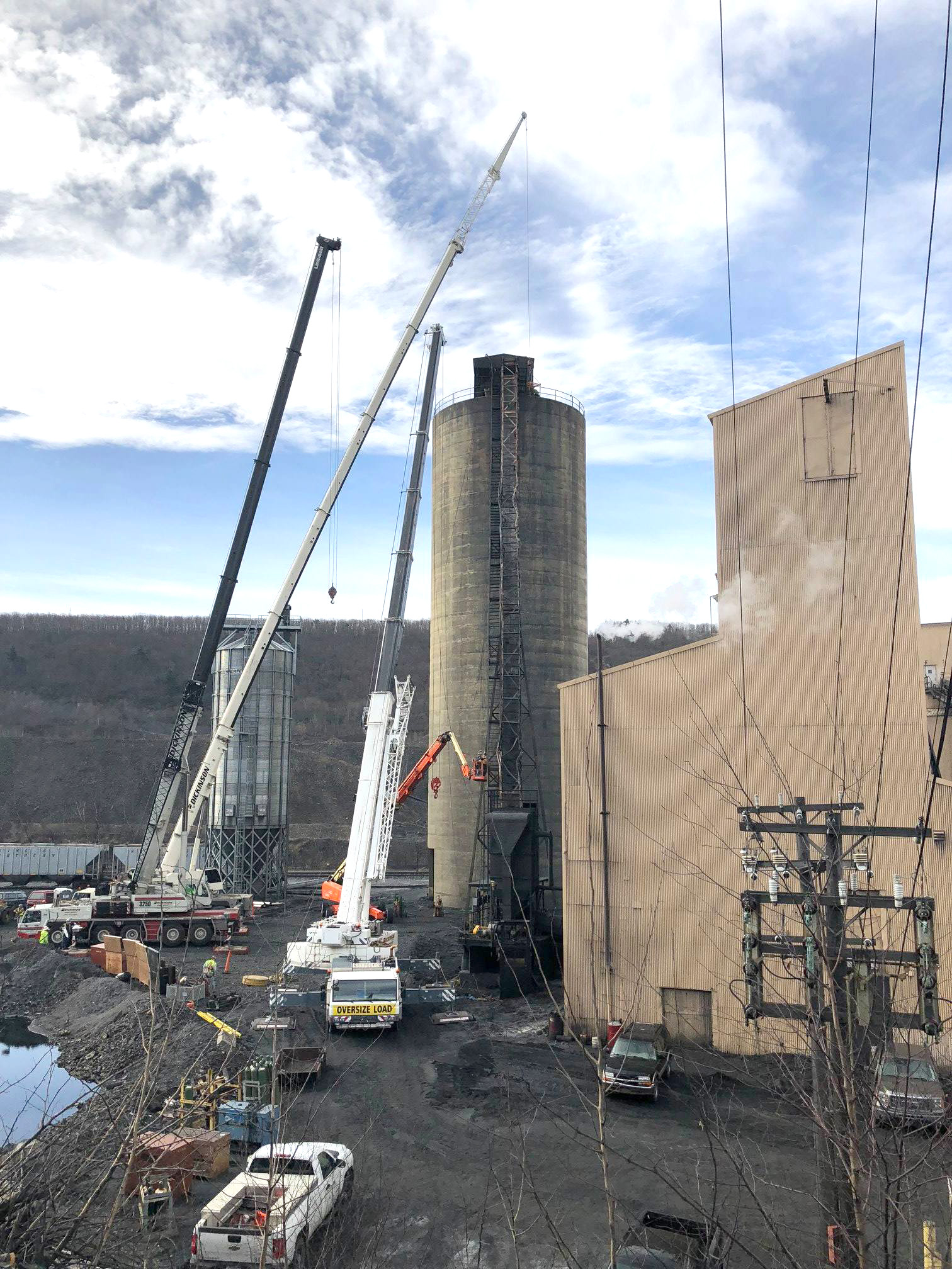 Photo of cranes working at a power plant