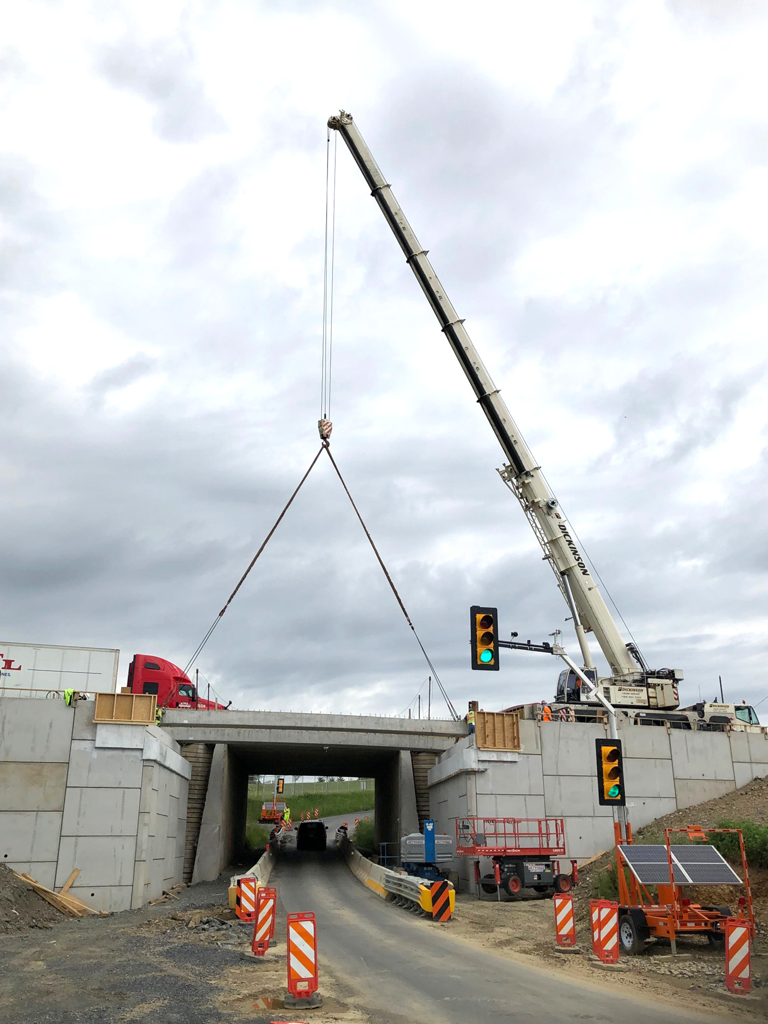 Photo of a crane at a bridge construction site